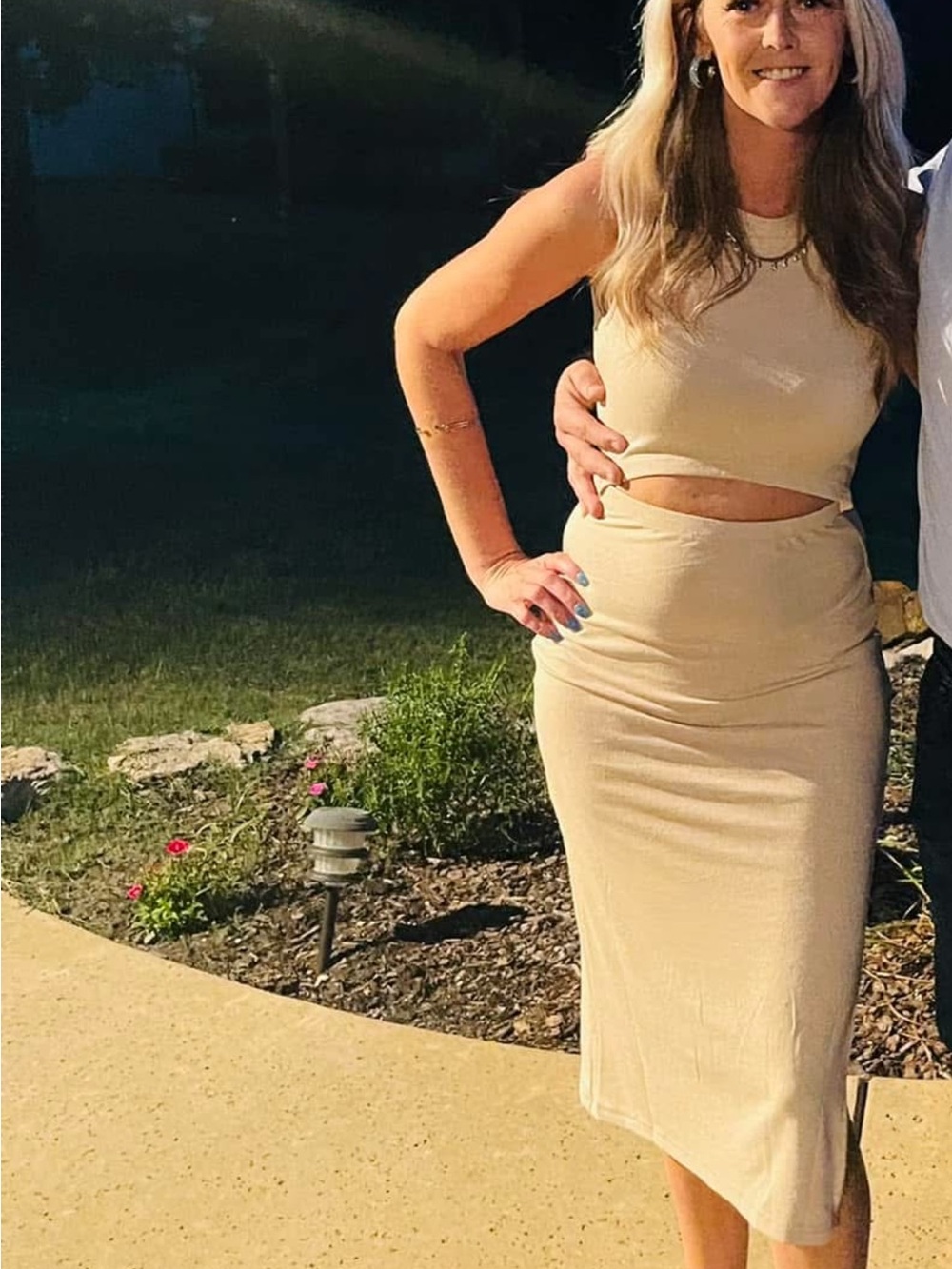 Tan Midi dress with cut out detail.